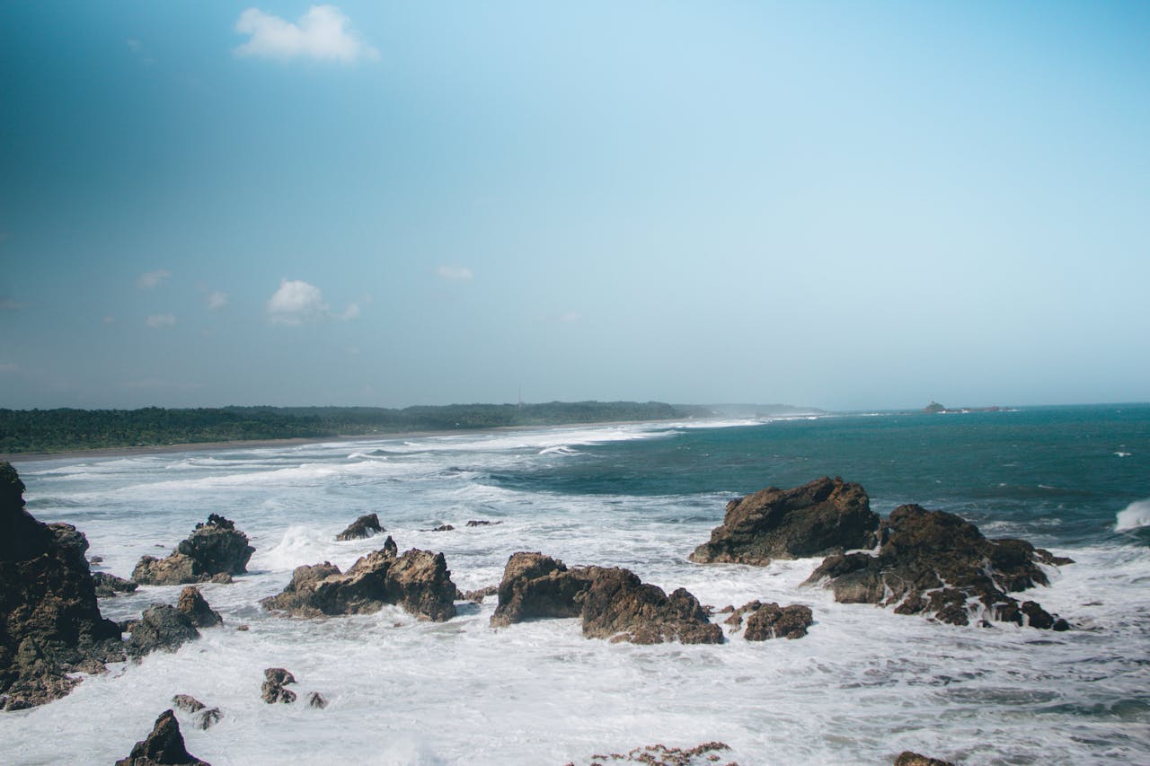 Capture the rugged beauty and dynamic waves of Tasikmalaya, West Java's captivating coastline.